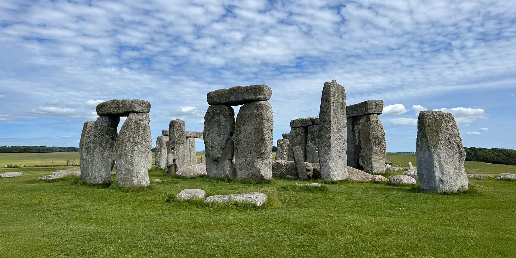 A standing stone circle under a wide sky